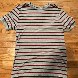 Striped Nike dry fit running shirt with pocket and reflective swoosh